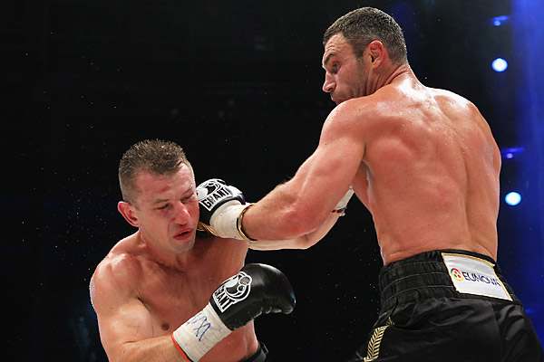 Tomasz Adamek (left) took some time off from boxing to sharpen his game. (Boris Streubel/Getty Images)  